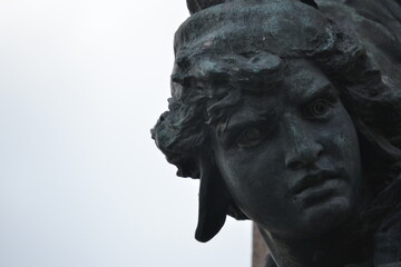 the face of a young Italian woman sculpted in Venice