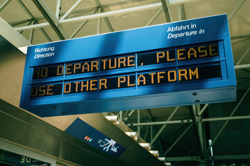At Frankfurt Airport, a unique sign with Western script provides travelers guidance on their departure direction and transportation options.