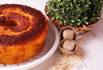 homemade corn cake, traditional from the rustic June parties, straw hat