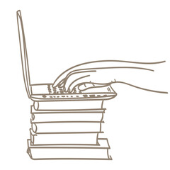 Hands at work on the laptop keyboard, the laptop lies on the books. Workplace at home.