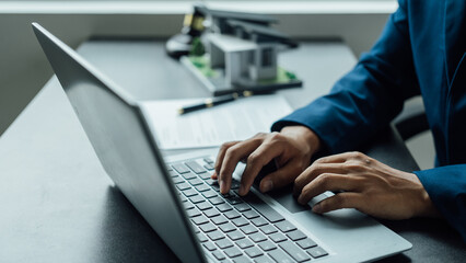 Legal consultant and real estate attorney lawyer read the building lease contract signing agreement for local business.