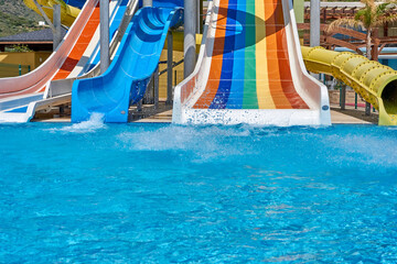 Colorful kids waterpark and a swimming pool