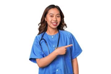 A young nurse chinese woman smiling and pointing aside, showing something at blank space.