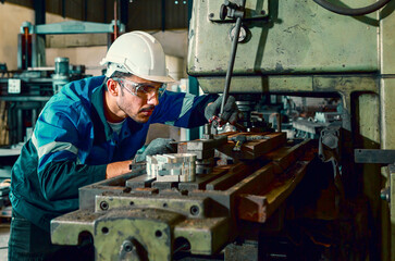 portraits of workers, technicians, professional engineers Safety helmet and production line controls