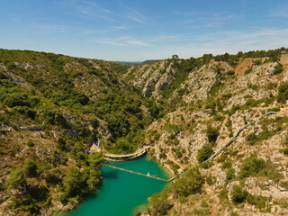 Fototapeta na wymiar Magnificent viewpoint from the Bimont dam in Provence in France ( near Aix en Provence ) especially with this deep valley