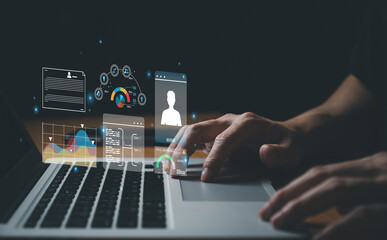 young entrepreneur using big data analysis and cloud technology to collect customer data and display on application dashboard from digital tablet to understand sale forecast and marketing plan.