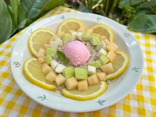Strawberry greek yogurt with over night oat milk and guava with mango and lemon