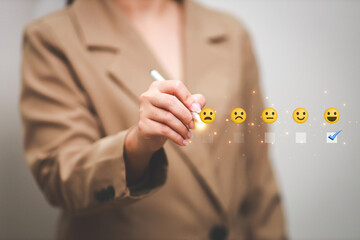 Customer pressing satisfaction with gold five star rating feedback icon and press level excellent rank for giving best score point to review the service , experience success business rate  concept.