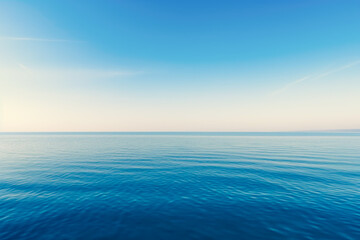 Obraz premium Blue sea with waves and sky with clouds.Calm tranquil blue sea relaxing background with copy space