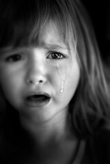 Little Girl Crying with Tears black and white dramatic and emotional sadness