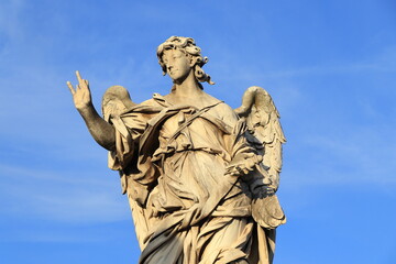 Ponte Sant'Angelo Brigde Statue of an Angel Holding the Nails of Christ's Cross in Rome, Italy