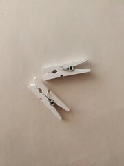 two white wooden clothespins, decorative clothespins for creativity