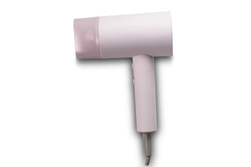 New single compact electric hair dryer and nozzle isolated on white background with clipping path, closeup, top view, horizontal format.