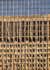 Abstract Blurred Building Reflected  in the Opposite Building Exterior.