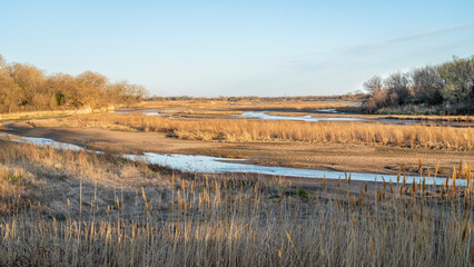 springtime sunrise over wide and shallow Platte River near Kearney, Nebraska