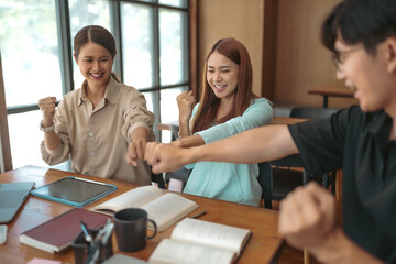 Asian student girl High School Tutor Individual Tuition From Teacher In Library. University Student Tutor books with friends.