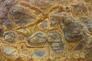 Fototapeta na wymiar Fascinating patterns in natural rock formations, Cape Woolamai, Phillip Island, south-southeast of Melbourne, Victoria, Australia