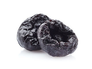 Dehydrated prunes in closeup on white background