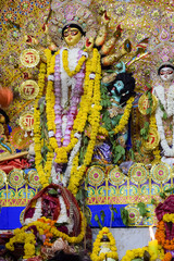 Fototapeta premium Goddess Durga with traditional look in close up view at a South Kolkata Durga Puja, Durga Puja Idol, A biggest Hindu Navratri festival in India