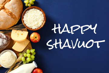 Jewish holiday Shavuot concept. Flat lay cottage cheese, grape, bottle of milk, bread, cheese,...