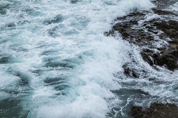 Waves crashing on Eoropie Beach on the coast of Outer Hebrides of Scotland
