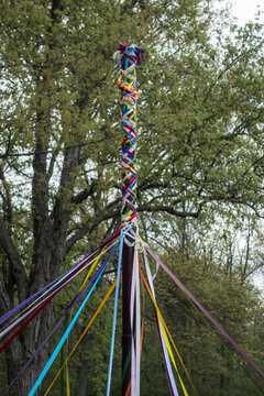 Pagan Maypole Ribbons Woven by Dance for Beltane Ritual on May Day