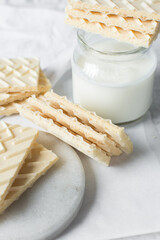 Vanilla wafers on a marble plate, wafer cookies filled with vanilla cream