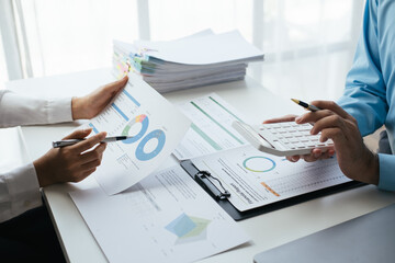 Close up businesspeople or colleagues are working together on investment project.