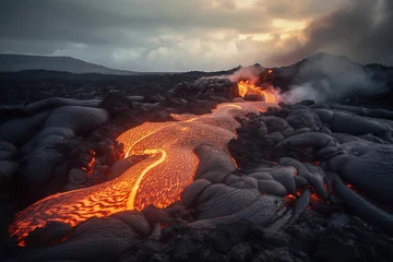 Zelfklevend Fotobehang river of lava from a erupting volcano © Vlad Podkhlebnik