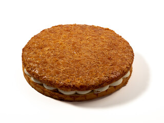 Bee sting cake, light cake with cream filling, with crispy almonds. Cake with almonds on a white background.