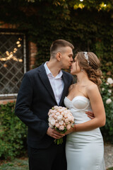portrait of a young couple of bride and groom on their wedding day