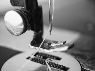 needle of a vintage sewing machine closeup