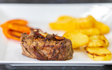 Filet mignon grilled with fine herbs and butter