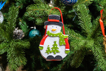 Russia. Kronstadt. January 19, 2023. A festive decoration is a toy in the form of a snowman bag on a Christmas tree.
