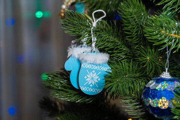 Russia. Kronstadt. January 19, 2023. Festive decoration in the form of mittens on the Christmas tree.