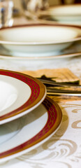 plates and cutlery on table
