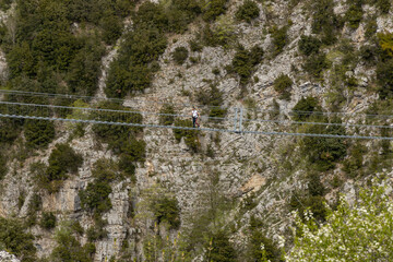 Longest Tibetan bridge in the world located in Castelsaraceno in Italy. The steel bridge spans 580m on a walkway with separate platforms overlooking a breathtaking panorama.