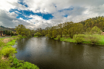 Fototapeta na wymiar Ohre river with green forests in spring color fresh morning