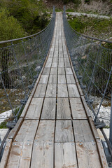 Longest Tibetan bridge in the world located in Castelsaraceno in Italy. The steel bridge spans 580m on a walkway with separate platforms overlooking a breathtaking panorama.