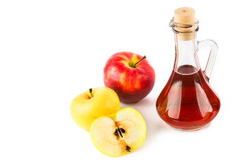 Apples and apple cider vinegar isolated on white. Free space for text.