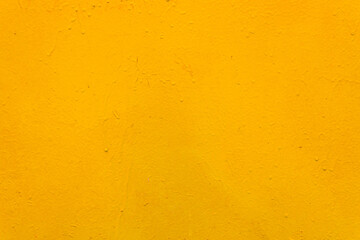 The metal surface is rough, with smudges, painted with yellow paint. Bright colored back.