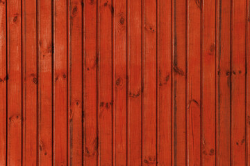Red wooden back. Rough boards. Natural wood texture and pattern.