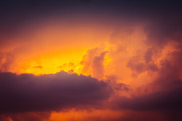 Beautiful storm cumulus clouds in the sky during sunrise or sunset, background