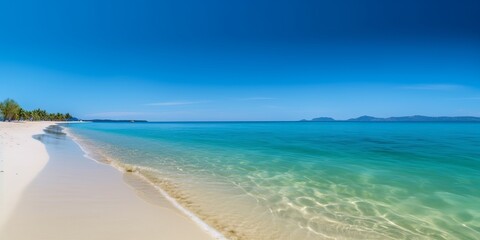 Obraz premium Beautiful tropical eaches and sea on blue background for wallpaper design. Travel background. Tropical beach.