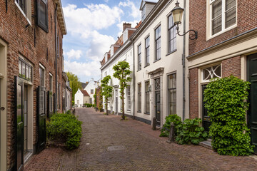 Narrow street with medieval houses in the historic center of Amersfoort.