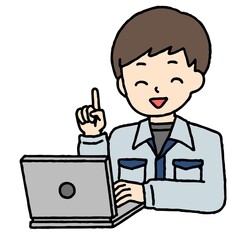 パソコン作業をする作業服の男性が笑顔で指差し