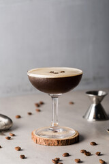 Espresso Martini cocktail boozy vodka, coffee liquor, espresso and syrup with coffee beans as...