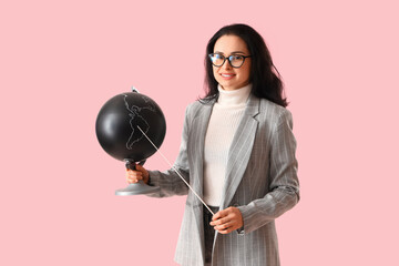 Geography teacher with globe and pointer on pink background