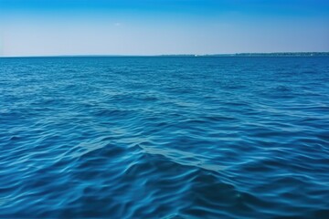 Obraz premium serene lake surrounded by mountains with a clear blue sky in the background. Generative AI