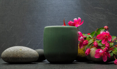composition with beautiful stones and plants for product presentation podium background.zen stones and flowers with free area for product for podium background.